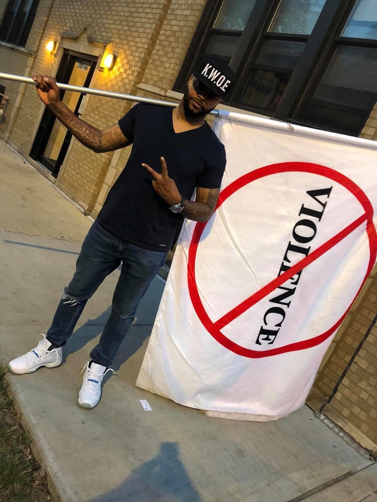 KWOE Passing with No Violence Flag on Westside